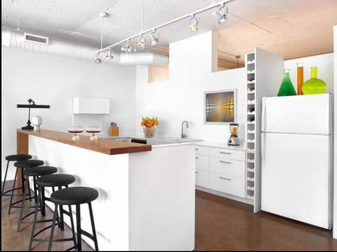 开放式厨房与餐厅一体设计 一个吧台有多种用途